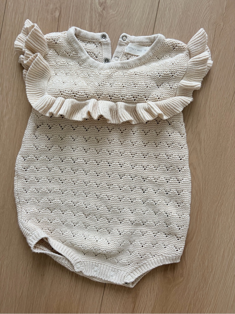 Quincy Mae Cream Knit Ruffle Baby One-Piece